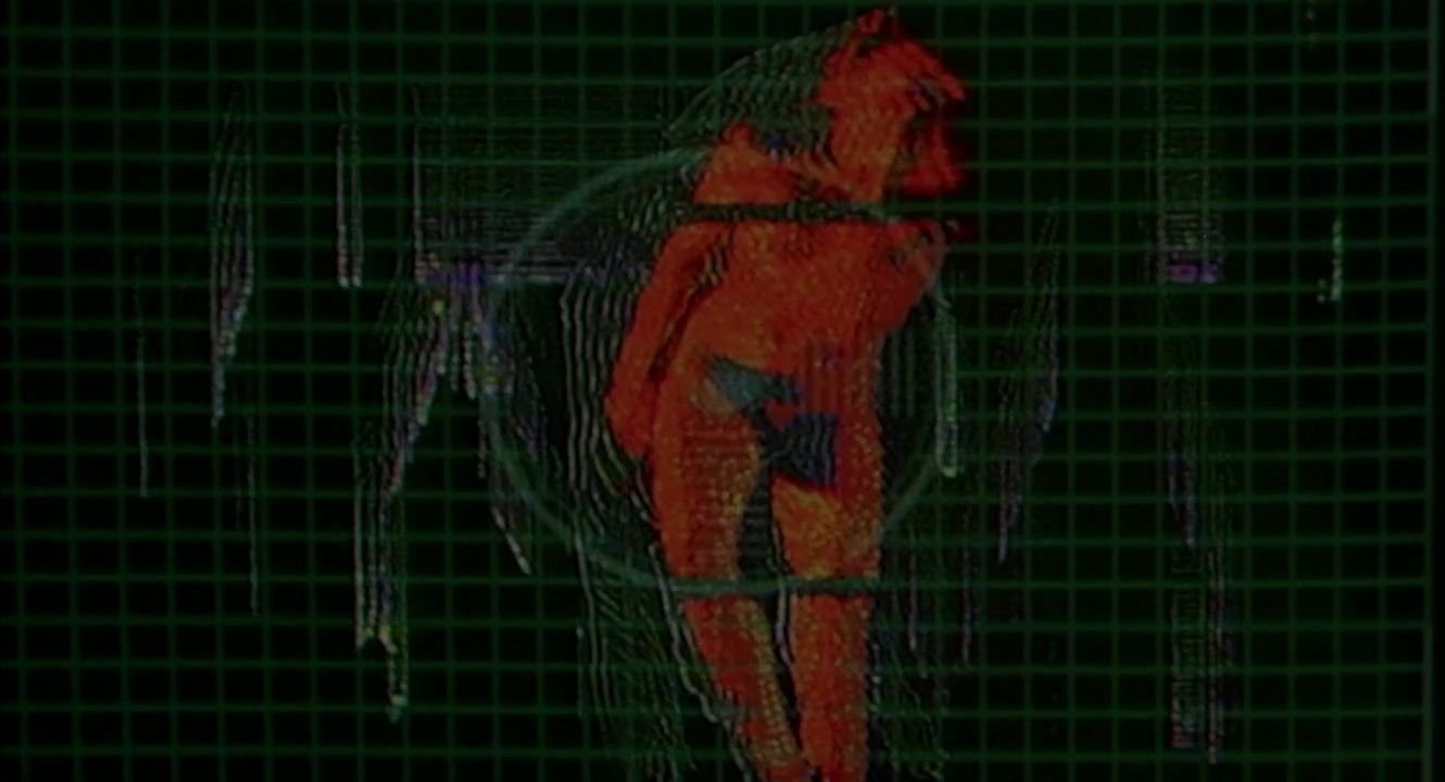 Men Stacey Travis nude – Hardware (1990) Squirters